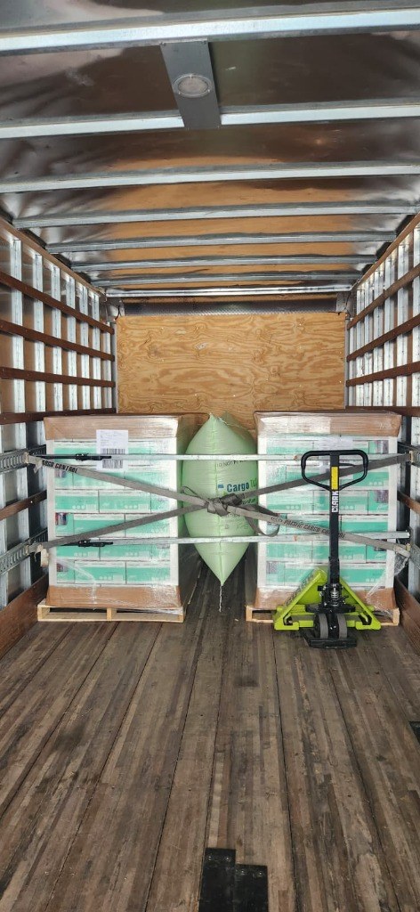 Dual Pallets Secured with Dunnage Airbag, Load Bars and Cross-Strapping