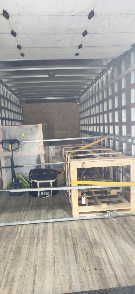 Custom Industrial Crates and Machinery Secured with E-Track Bars