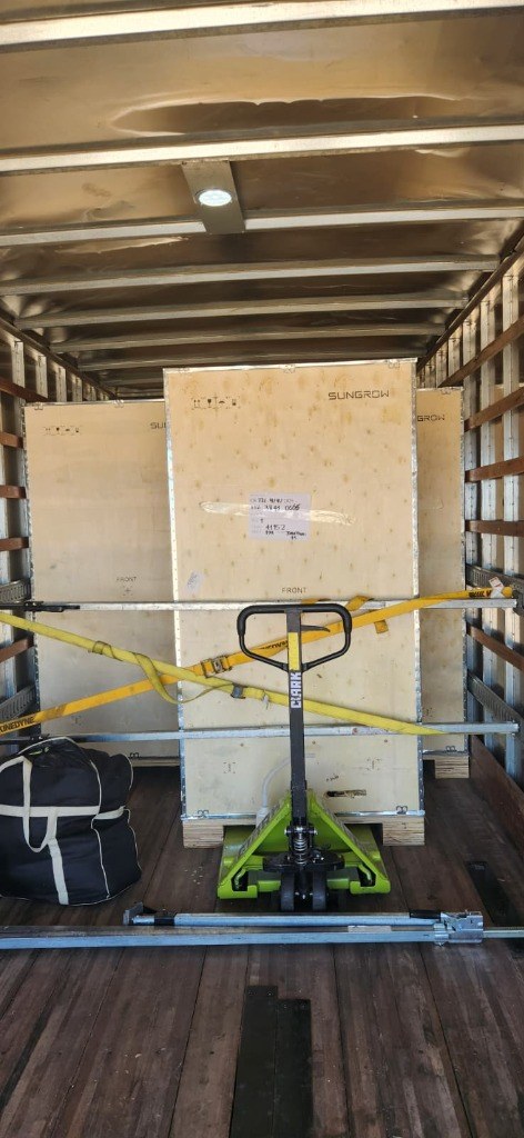 Heavy Commercial Equipment Crates Secured with E-Track and Ratchet Straps