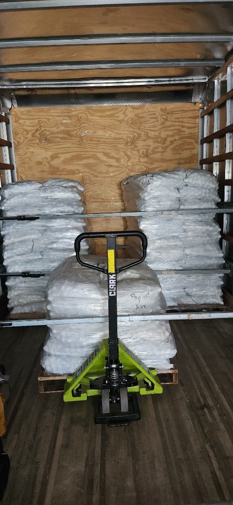 Shrink-Wrapped Bulk Pallets and Onboard 5,000 lb Pallet Jack